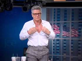 DONNY DEUTSCH TAKES OFF HIS SHIRT DURING INTERVIEW